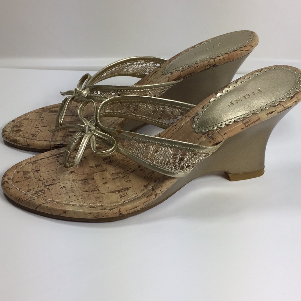 FIONI gold sandals size 6.